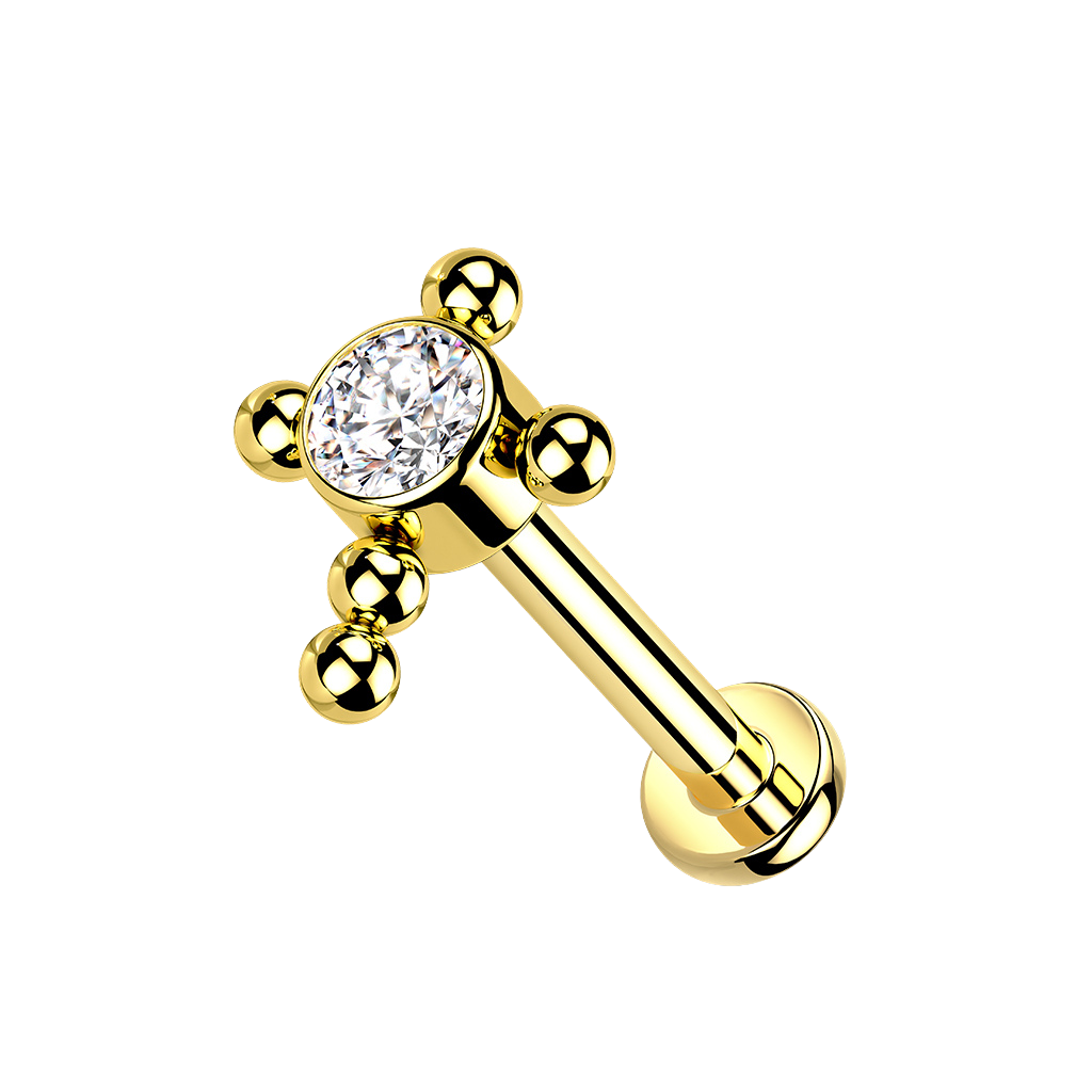 Diamond Cross, piercing labret en forma de cruz, en dorado