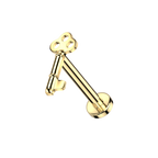 Secret, piercing labret en forma de llave
